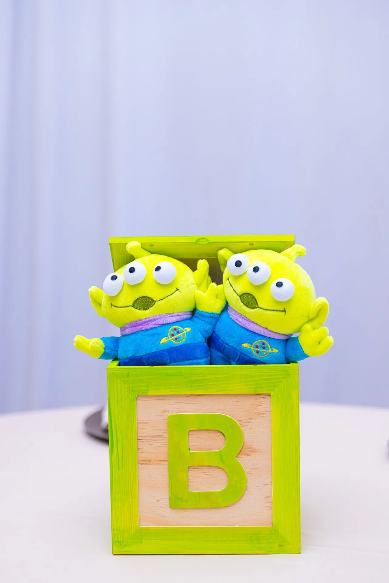 Its a boy story alien centerpiece. Toy Story Baby Shower