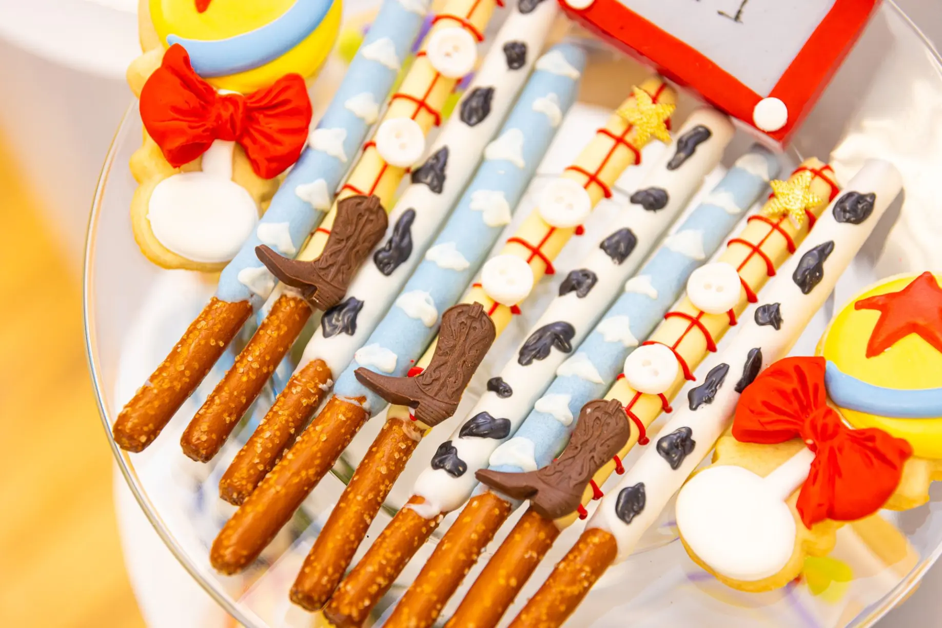 Its a boy story dessert display with themed pretzel rods. Toy Story Baby Shower