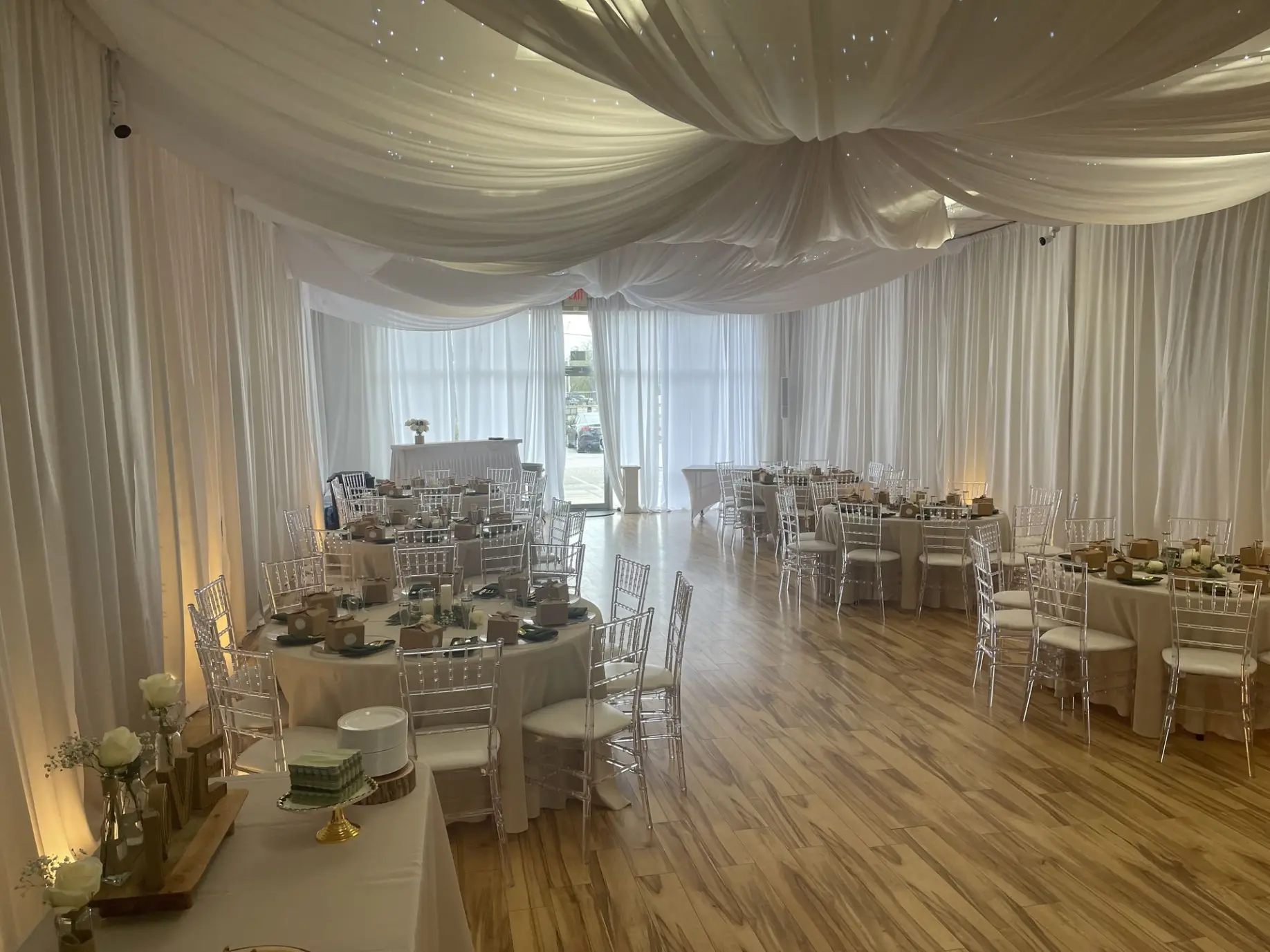 A wide-angle shot of your Orlando event space, showing tables, chairs, lighting, and décor in a finished setup.
