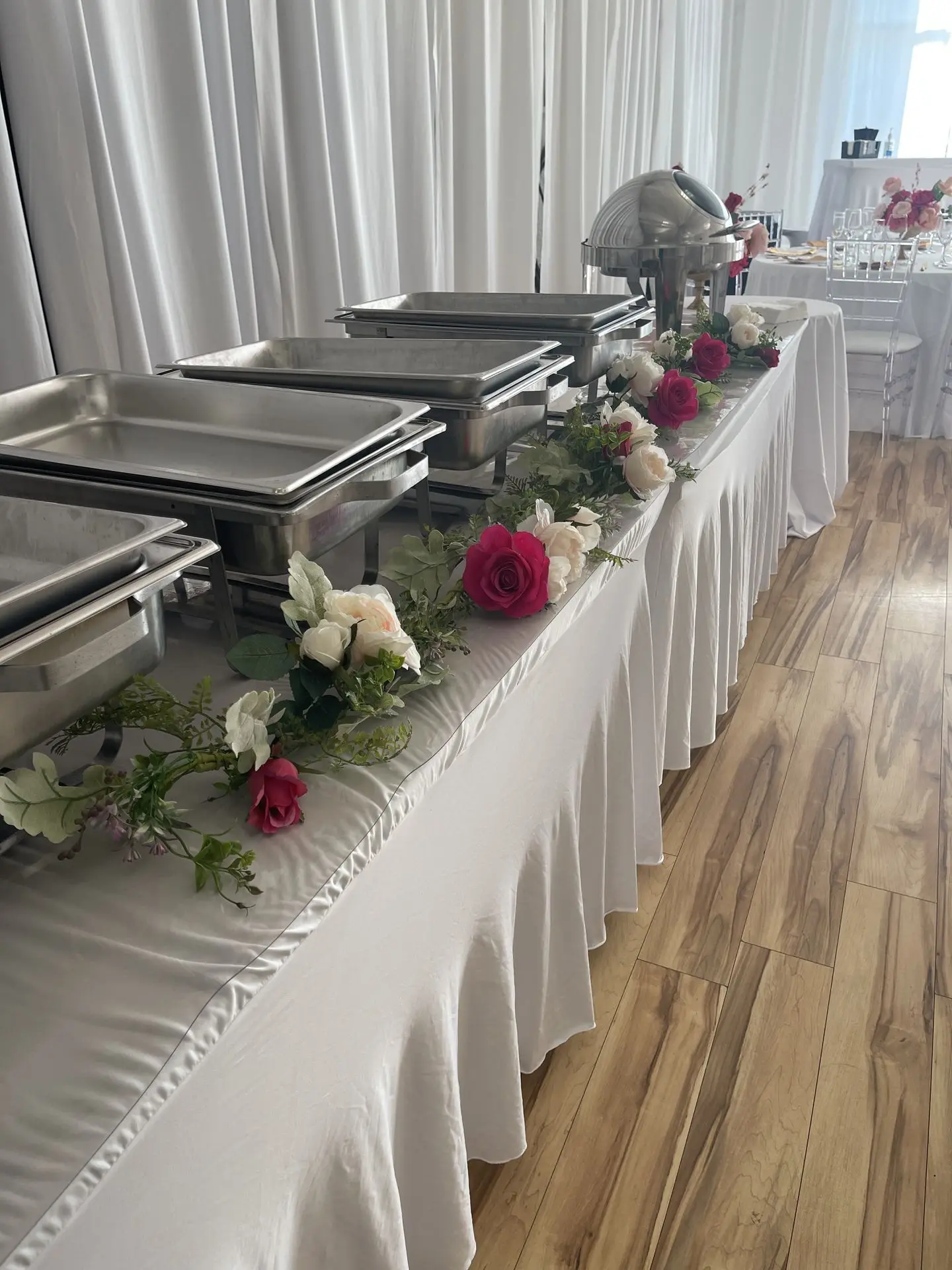 Celebration of life event with floral décor buffet setup