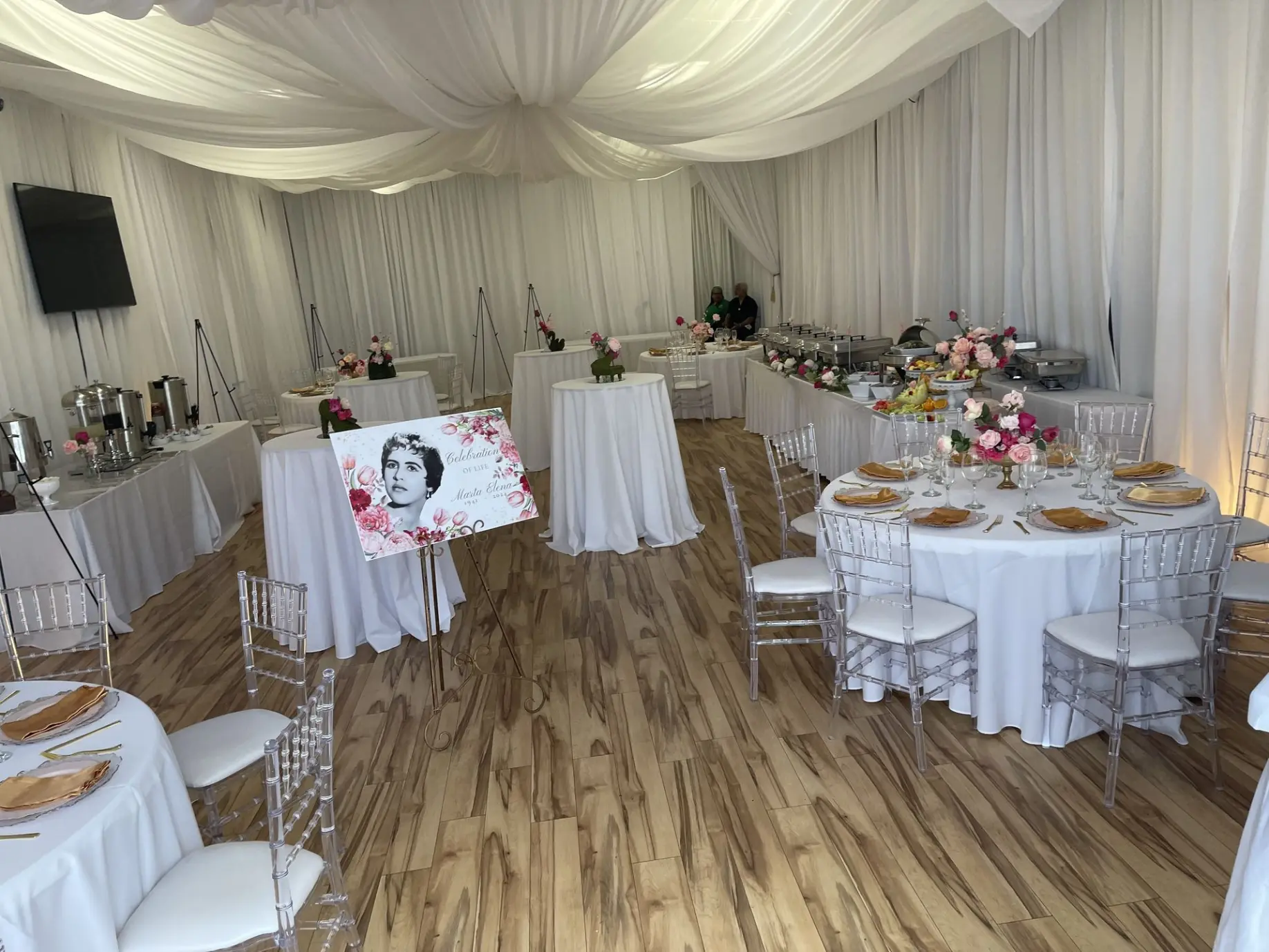 A wide-angle shot of your Orlando event space, showing tables, chairs, lighting, and décor in a finished setup.