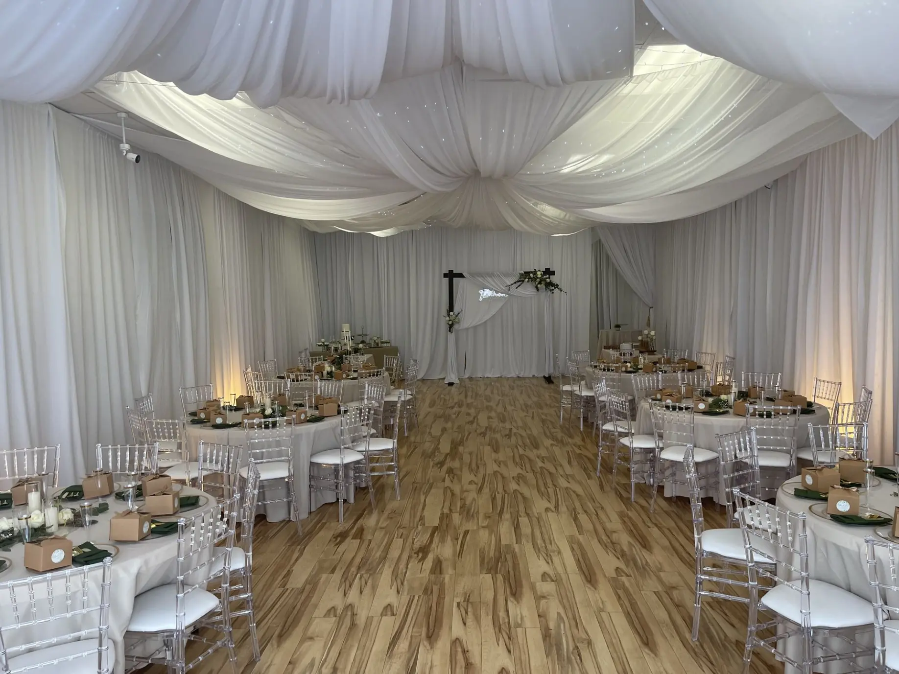 A wide-angle shot of your Orlando event space, showing tables, chairs, lighting, and décor in a finished setup.