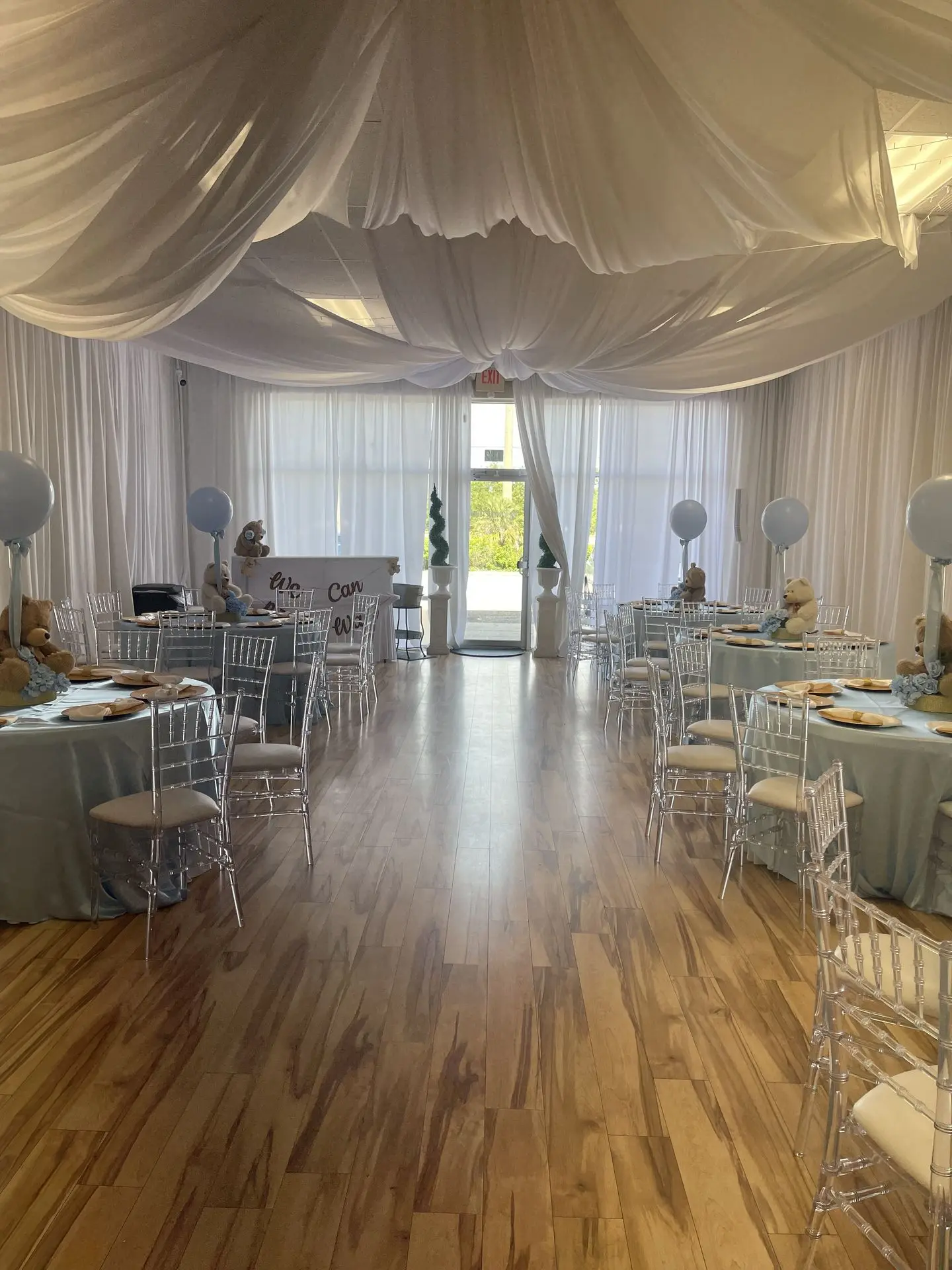 A wide-angle shot of your Orlando event space, showing tables, chairs, lighting, and décor in a finished setup.