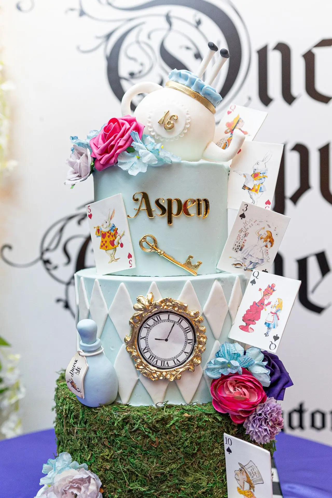 Alice in wonderland themed whimsical cake