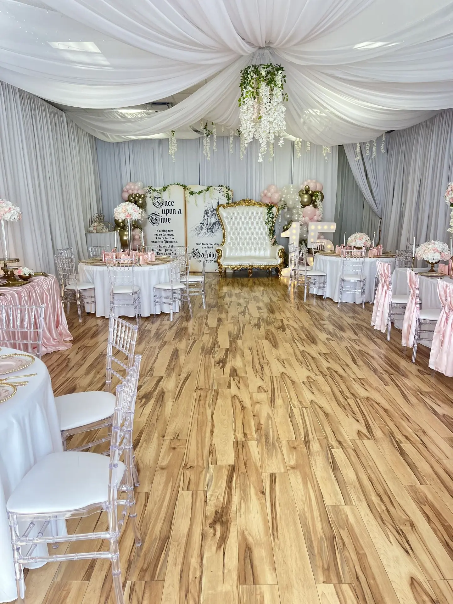 A wide-angle shot of your Orlando event space, showing tables, chairs, lighting, and décor in a finished setup.