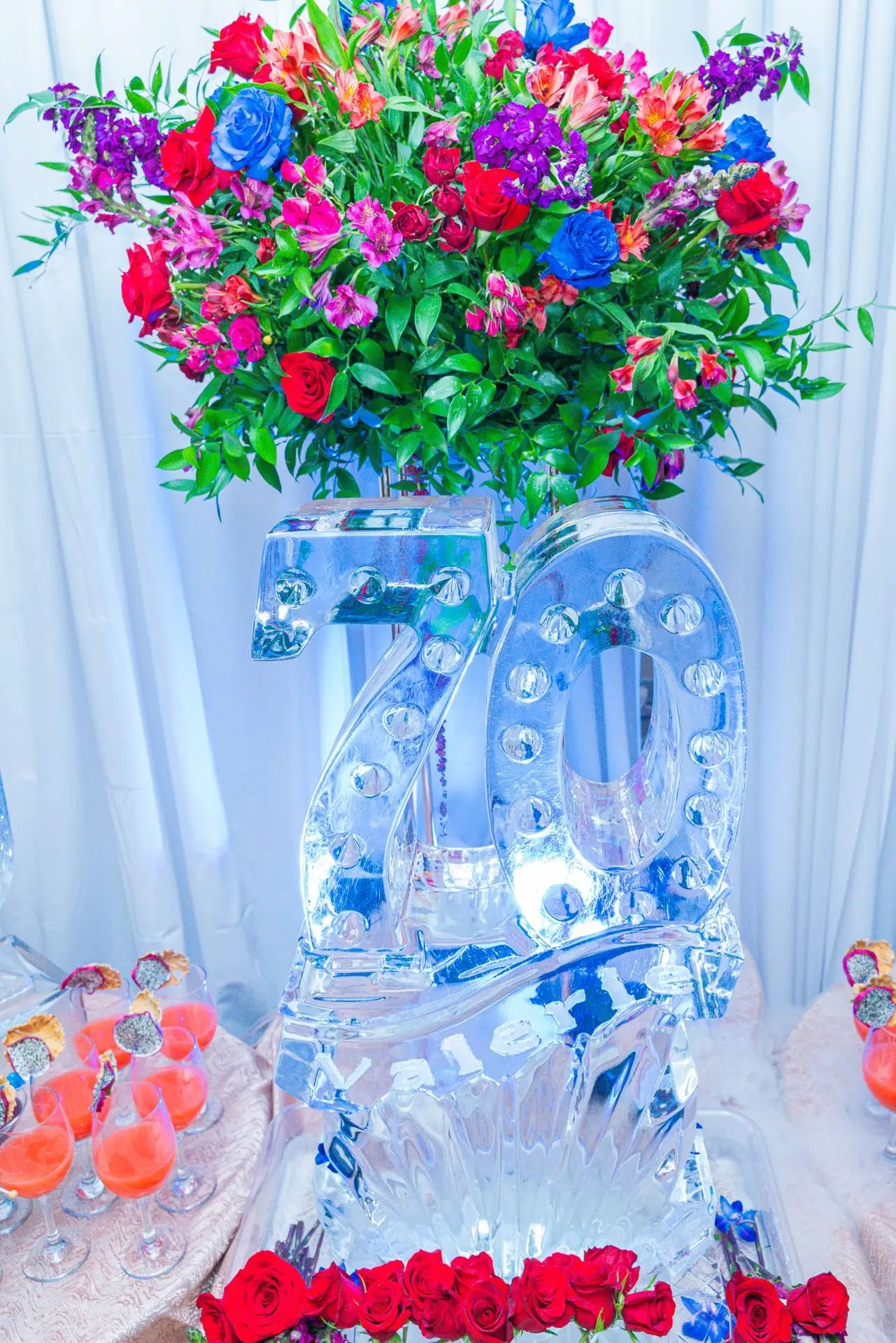 Ice sculpture with fresh floral luxe Signature Cocktail Display